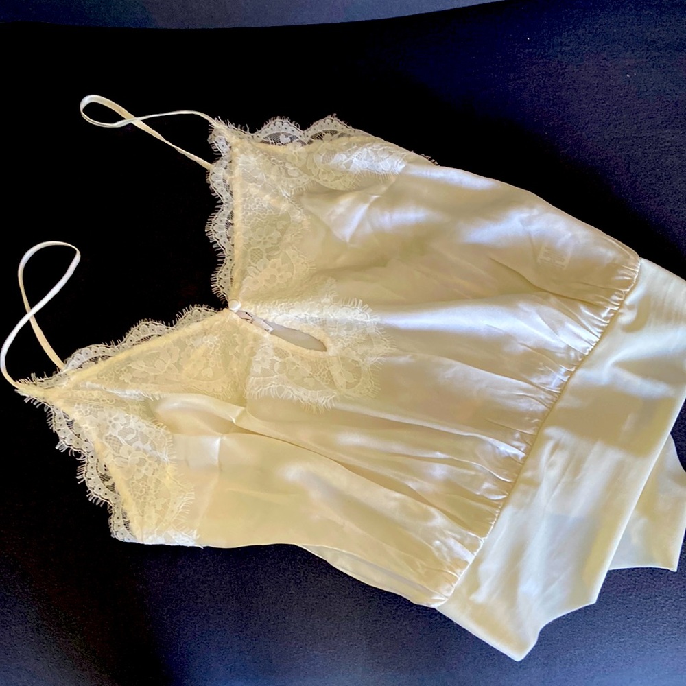 A beautiful Cami NYC silk bodysuit with lace detail, never worn!